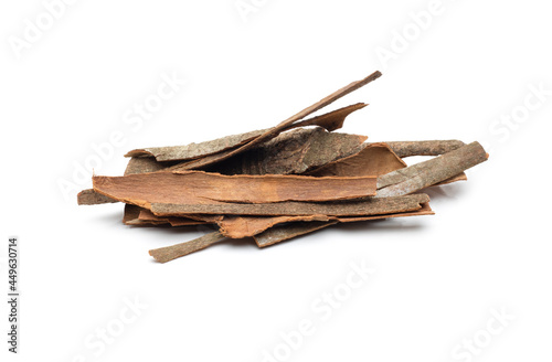 Spicy cinnamon bark close up on isolated white background