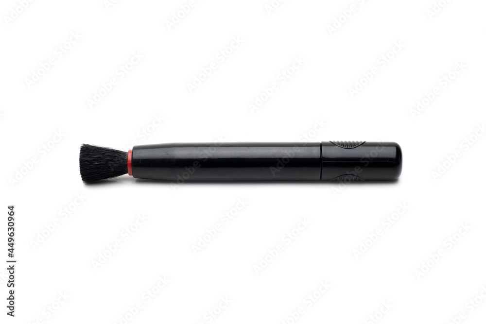 Camera and lens cleaning black brush on isolated white background Camera and lens cleaning black brush on isolated white background