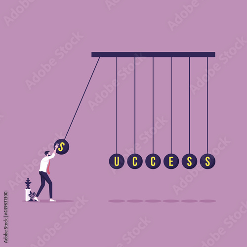 Make impact to success-Goal achievement concept, Businessman with success word on balancing balls newtons cradle