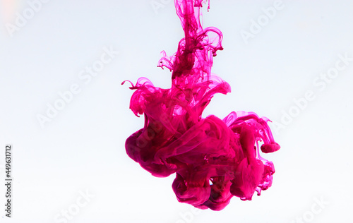 a pink color explosion on a white background