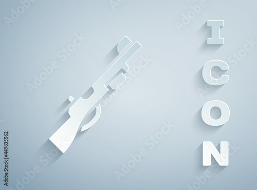 Paper cut Hunting gun icon isolated on grey background. Hunting shotgun. Paper art style. Vector