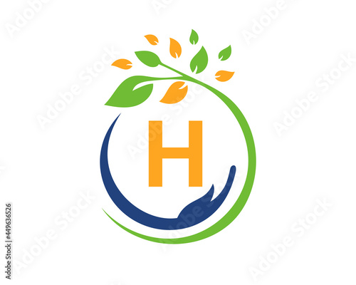 Charity logo with hand, leaf and H letter concept. Hand care foundation logo