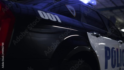 Police body of car with logo. Detailed view of patrol vehicle with emblem photo