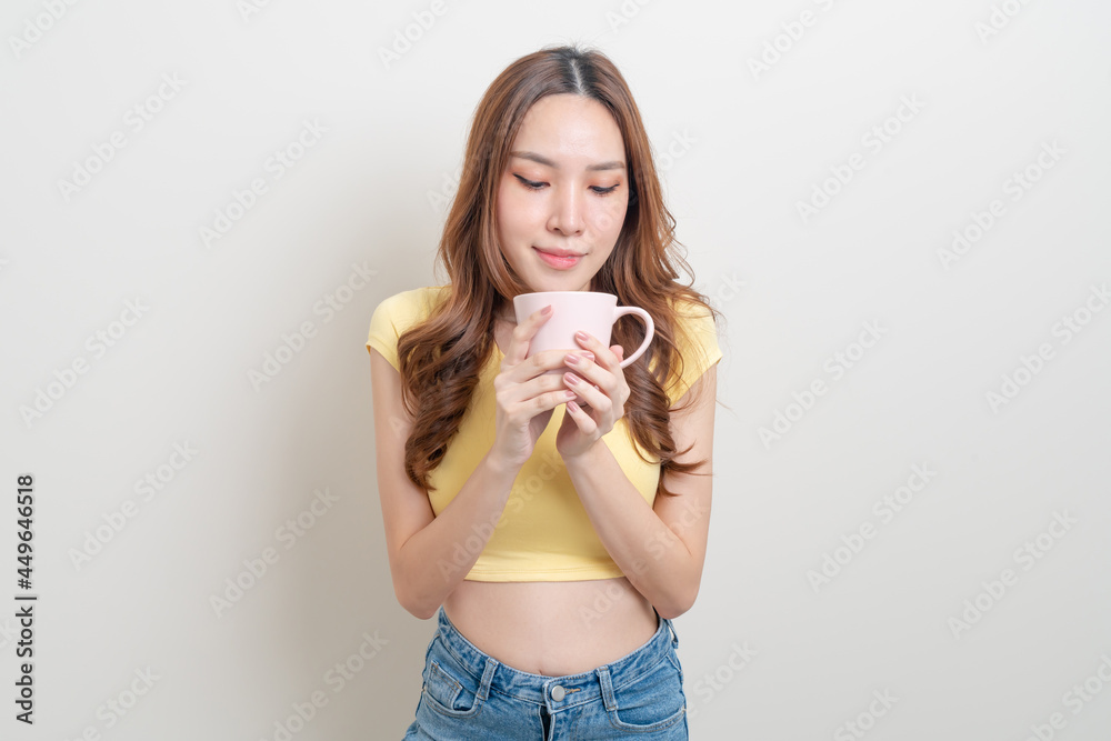 portrait beautiful Asian woman holding coffee cup or mug portrait beautiful Asian woman holding coffee cup or mug