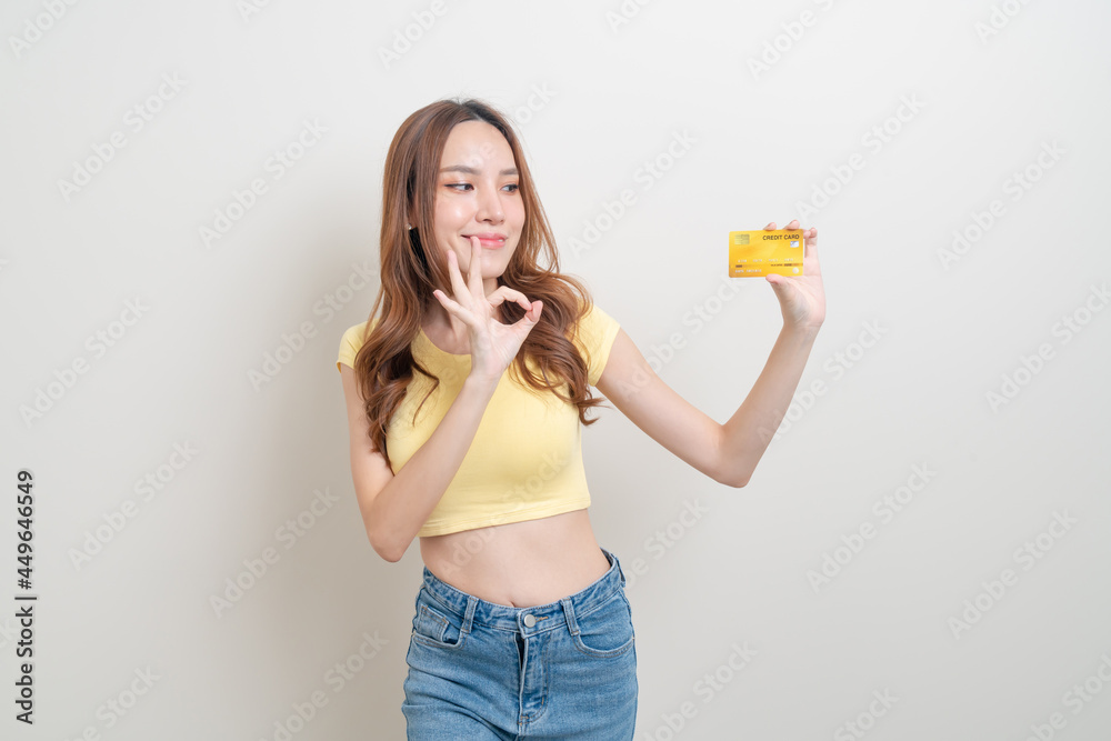 portrait beautiful Asian woman holding credit card portrait beautiful Asian woman holding credit card