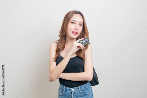 portrait beautiful Asian woman holding credit card