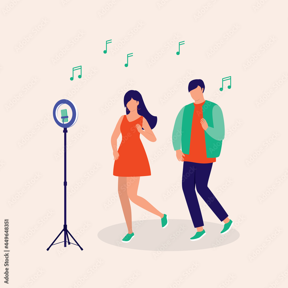 Young Couple Performing Pop Music Dance On Live Streaming Using Mobile