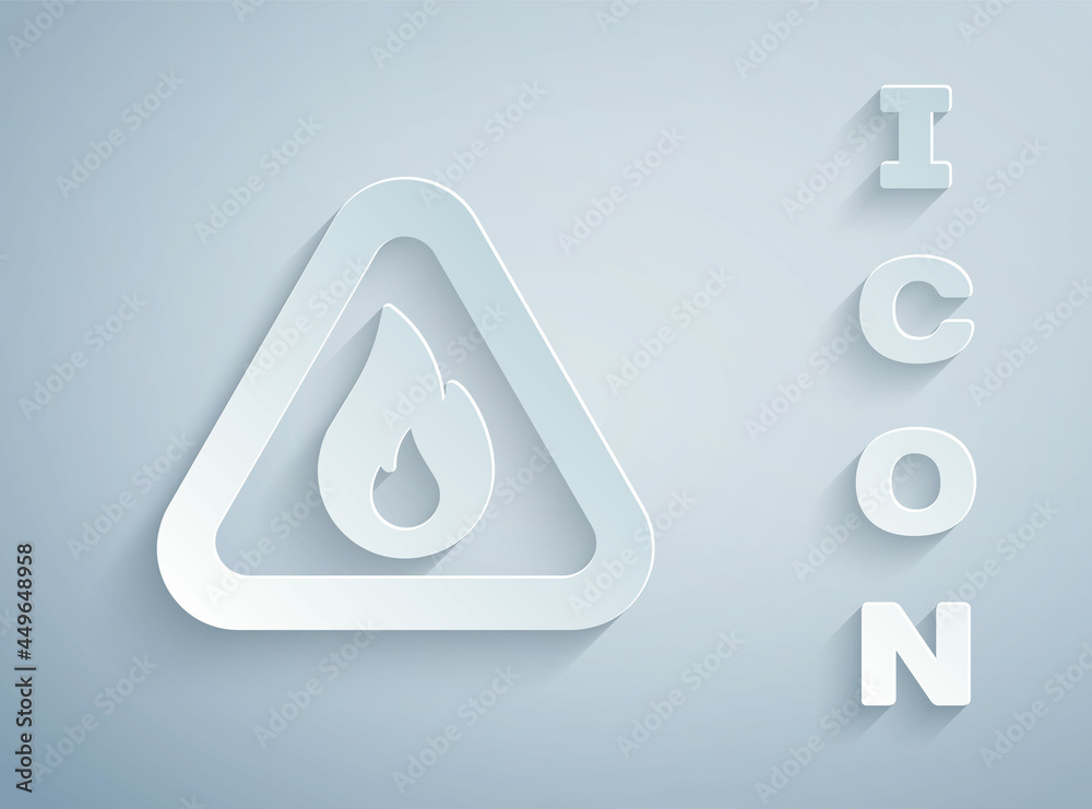 Paper cut Fire flame in triangle icon isolated on grey background. Warning sign of flammable product. Paper art style. Vector Paper cut Fire flame in triangle icon isolated on grey background. Warning sign of flammable product. Paper art style. Vector