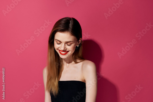 pretty woman in a black dress makeup decorations