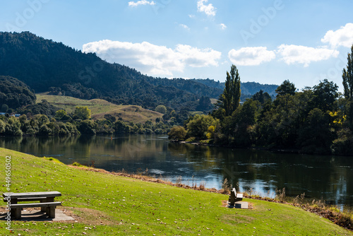 Riverbank of the Waikato River in Ngaruawahia, New Zealand photo