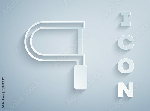 Paper cut Hacksaw icon isolated on grey background. Metal saw for wood and metal. Paper art style. Vector
