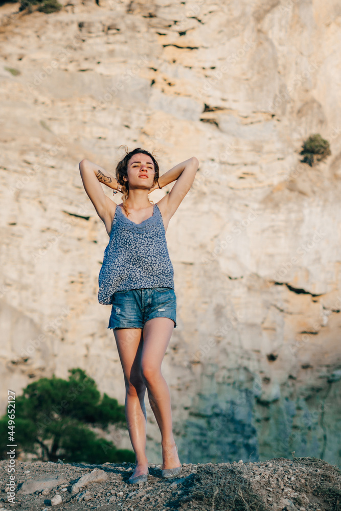 happy traveler girl enjoys freedom on top of mountain happy traveler girl enjoys freedom on top of mountain
