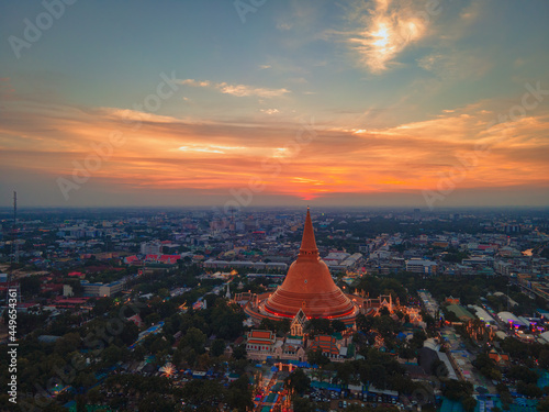 The aerial view of big pagoda in Nakhon Patom, Thailand with sunset background