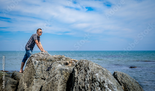 man on the rocky seashore