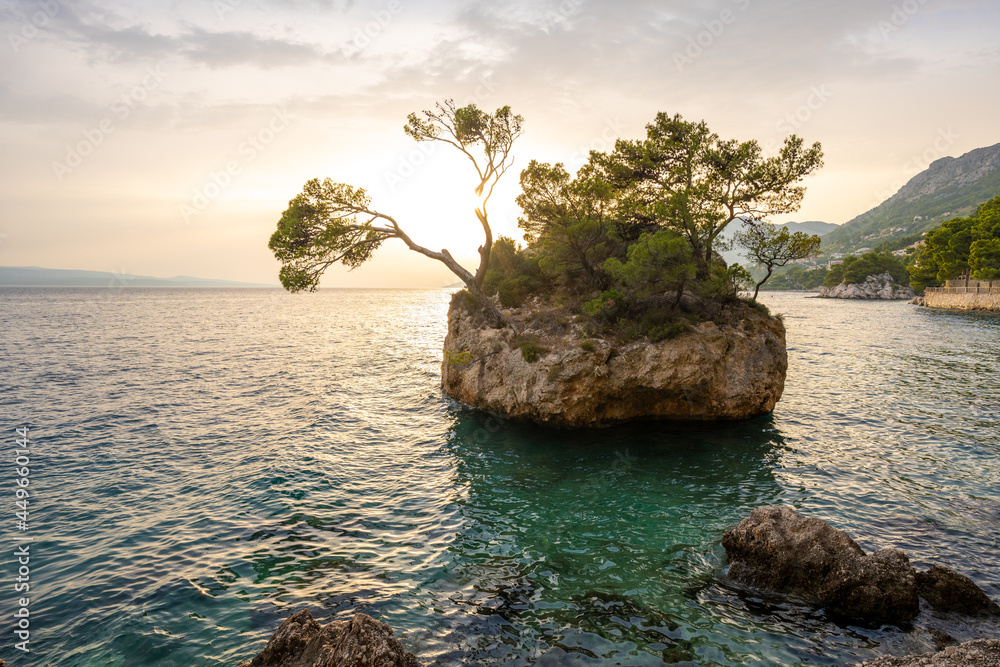 Brela stone - symbol of Brela during summer sunset in Makarska riviera, Dalmatia, Croatia