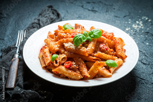 Delicious pasta bolognese with parmesan and basil. Italian cuisine.