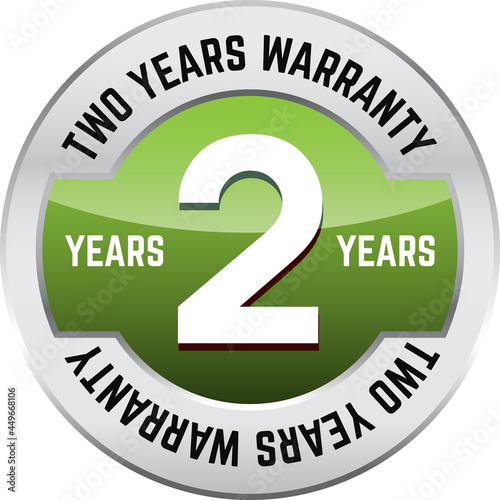 TWO YEARS WARRANTY shiny button. Bright metal shiny circular button with words TWO year warranty on it.