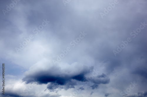 Abstract image of blurred sky. Blue sky background with cumulus clouds © supersomik