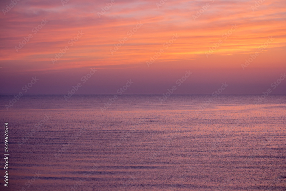 Clouds and sea water, sunset colors, sunrise