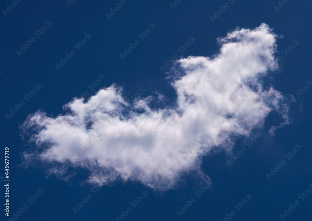 white clouds float across the blue sky white clouds float across the blue sky