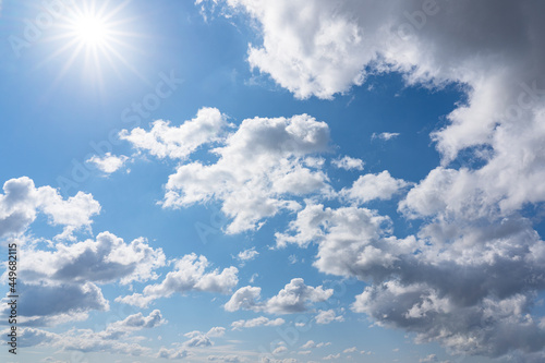Fototapeta Naklejka Na Ścianę i Meble -  Blue sky with bright sun and scattered clouds over the Netherlands