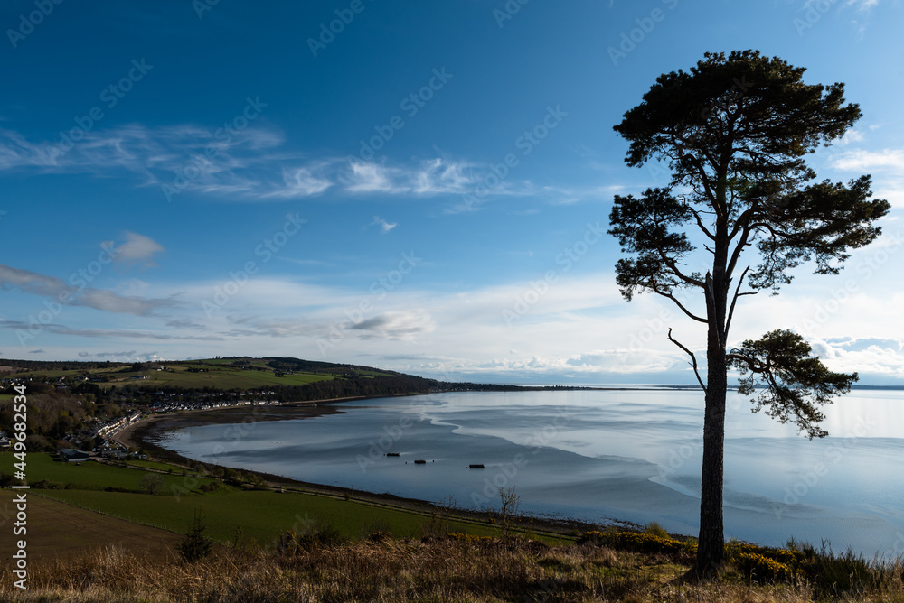 tide receding from avoch in the scottish highlands