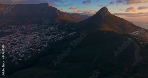 Aerial: Table Mountain in Cape Town South Africa at Sunset. 
