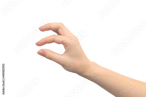 Hand gesture showing size, isolated on a white background, young female hand close-up