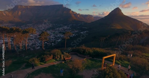 Aerial: Table Mountain & Signal Hill at sunset.  Cape Town, South Africa.