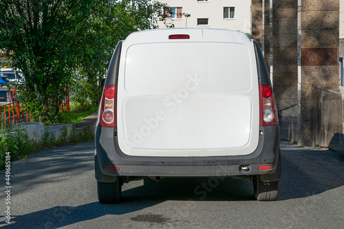 Mock up, an empty white space for advertising, text on the back of a car on the street photo