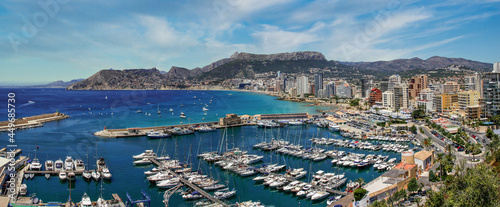panoramic view of a marina and beaches and mountains in the background in the city of Calpe. Coastal city located in the Valencia Community, Alicante, Spain
