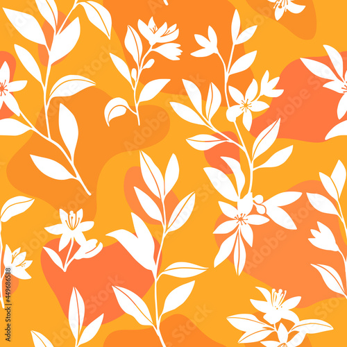 Seamless pattern with citrus flowers on a yellow background.