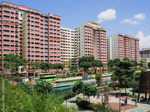 Overview of a residential estate in Singapore with light traffic passing through photo