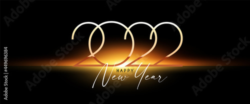 Happy new 2022 year Elegant gold text with light. Minimalistic text template