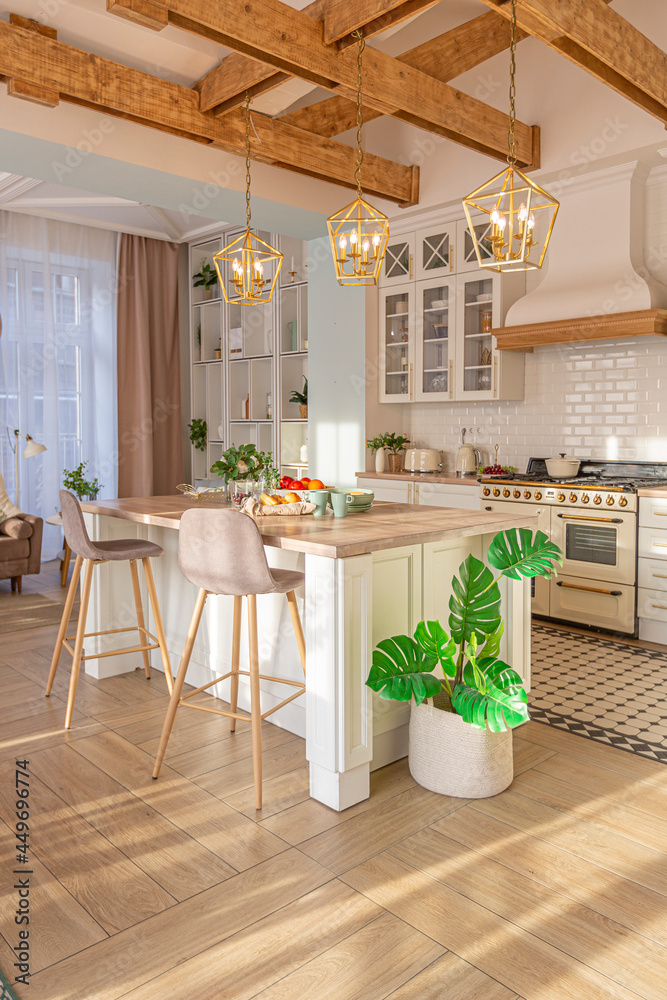 Fototapeta premium modern expensive luxurious open-plan apartment. Rich Scandinavian-style interior with wooden beams on the ceiling in pastel colors