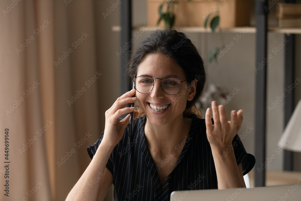 Close up smiling woman in glasses making phone call, talking, holding smartphone, friendly businesswoman consulting client, happy young female chatting with friend or boyfriend, pleasant conversation Close up smiling woman in glasses making phone call, talking, holding smartphone, friendly businesswoman consulting client, happy young female chatting with friend or boyfriend, pleasant conversation