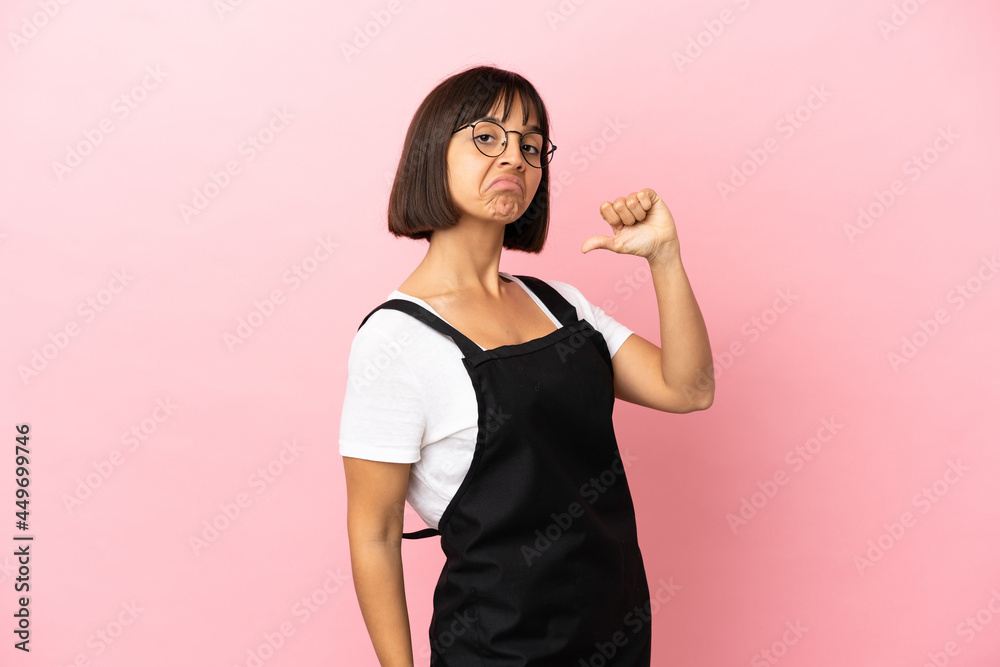 Restaurant waiter over isolated pink background proud and self-satisfied Restaurant waiter over isolated pink background proud and self-satisfied