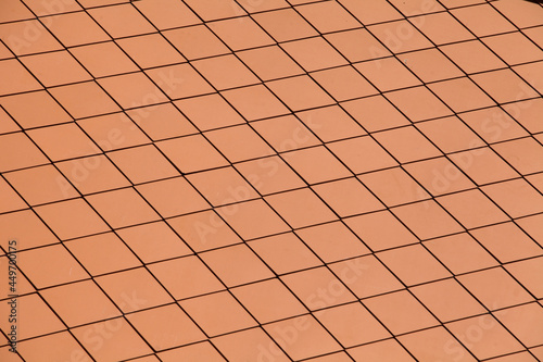 Red tiles roof background.