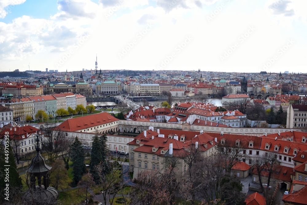 High angle view of historical sights with terracotta roof tiles in Prague, capital of the Czech Republic.