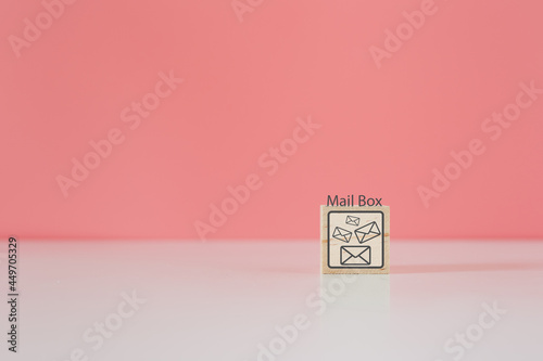 Wooden cube blocks with letter icon and mailbox word. contact mail message. online logistic concept.