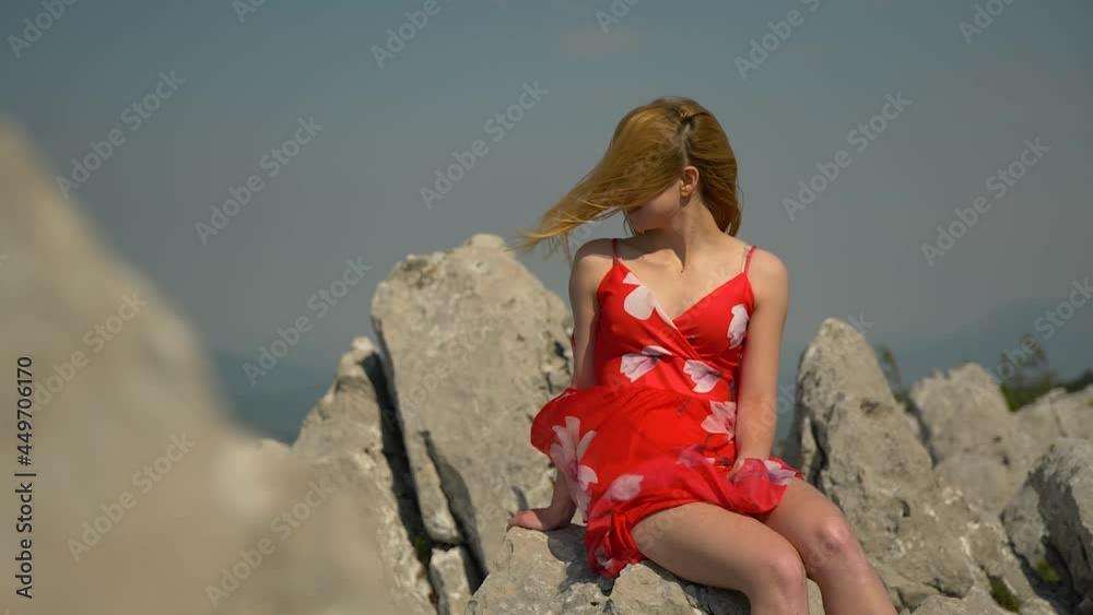 woman in dress on the mountain