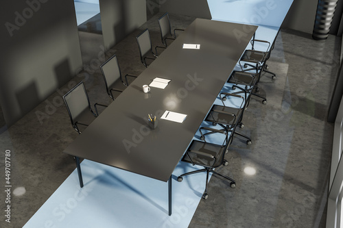 Office room interior with large table and eight armchairs