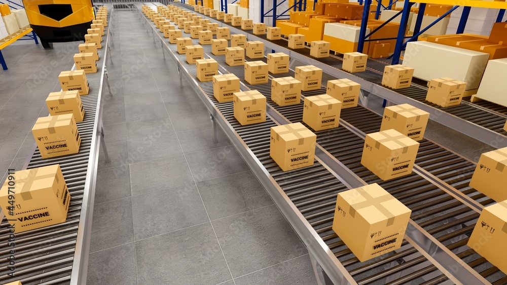 Vaccine bottles on the production line. Coronavirus Warehouse with cardboard boxes inside on