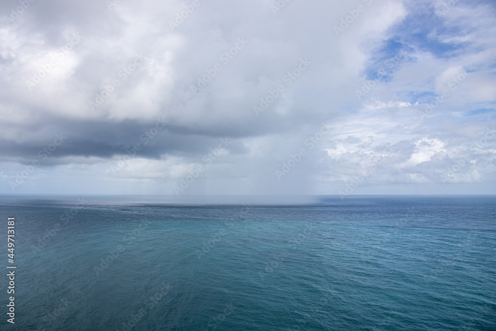 Raining clouds over the sea