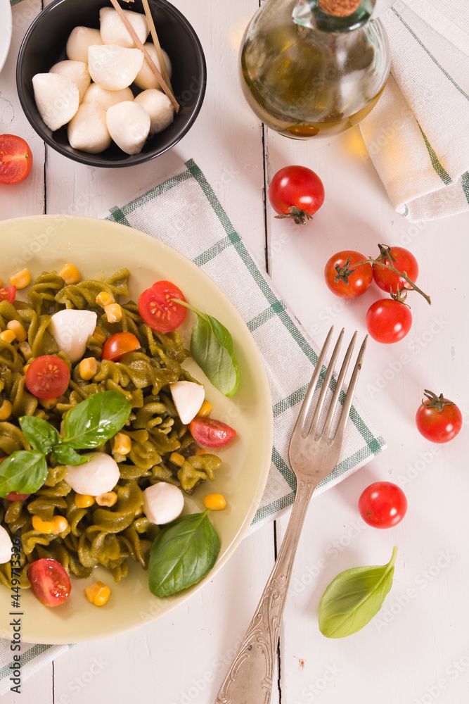 Fusilli pasta with cherry tomatoes and sweet corn. Fusilli pasta with cherry tomatoes and sweet corn.