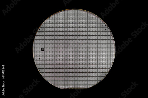 A microcircuit of a powerful Darlington transistor on a cut scribed semiconductor silicon multilayer wafer. Semiconductor chip is a crystal of a microcircuit without a package
