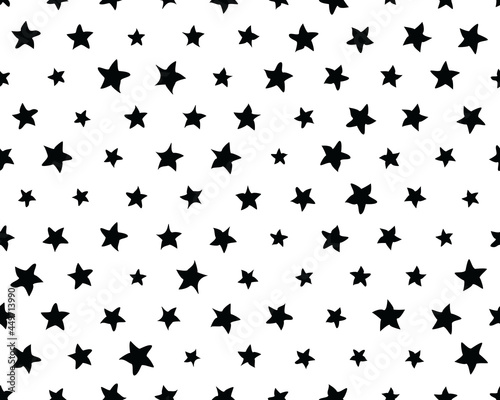 Seamless pattern with black  stars on white background	