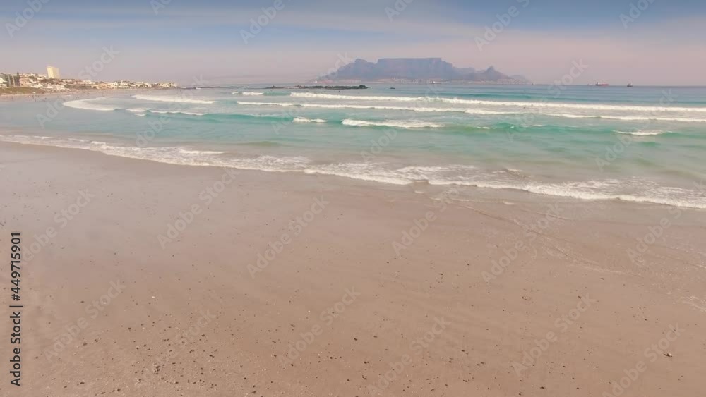 Aerial: Waves Crashing on tropical beach. Cape Town, South Africa Aerial: Waves Crashing on tropical beach. Cape Town, South Africa