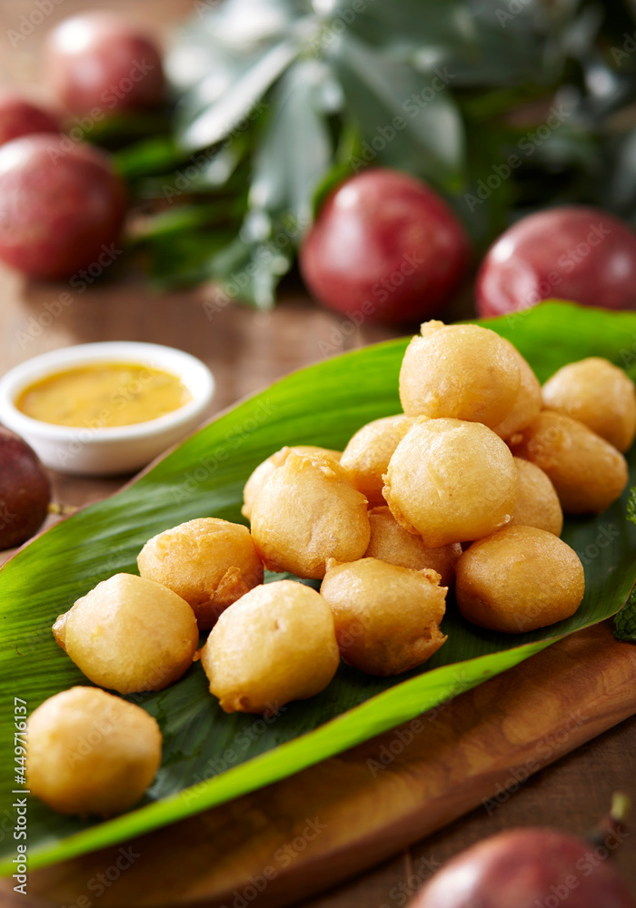 Delicious and refreshing Chinese summer dishes, croquettes with passion fruit sauce