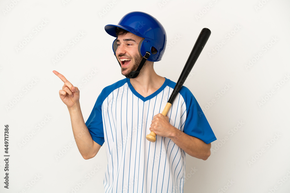 Young caucasian man playing baseball isolated on white background intending to realizes the solution while lifting a finger up Young caucasian man playing baseball isolated on white background intending to realizes the solution while lifting a finger up